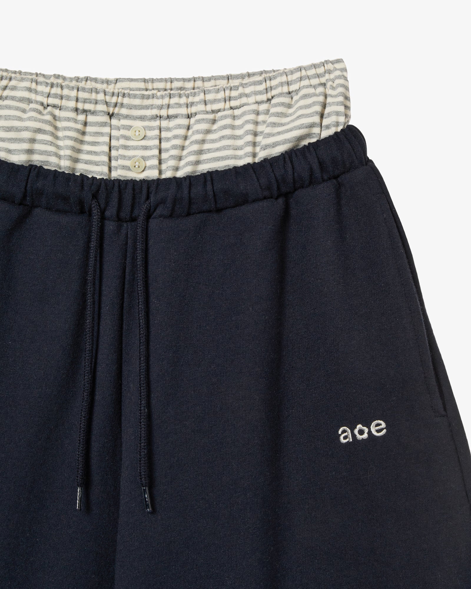 BRIEFS LAYERED SWEATPANTS [NAVY]