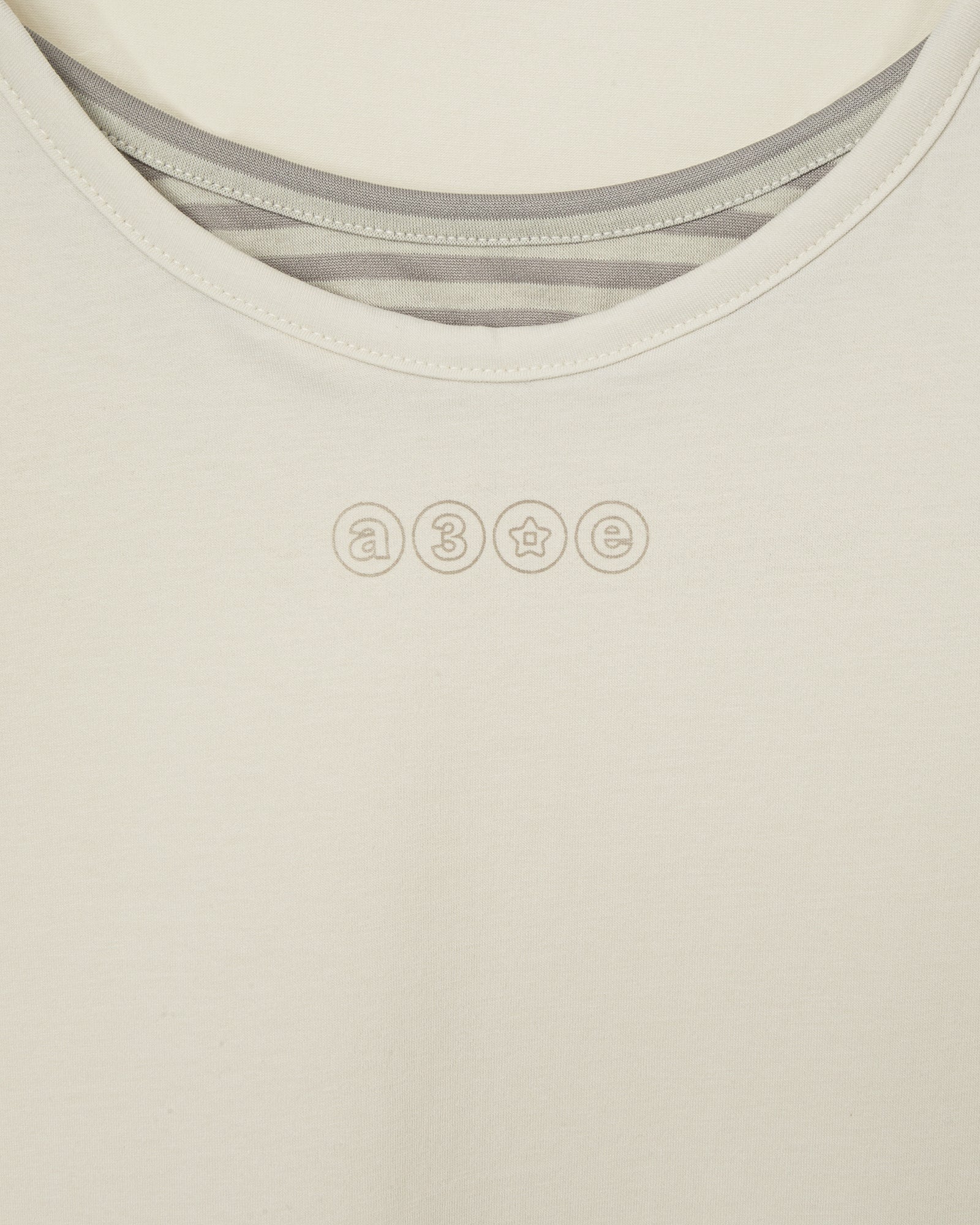 STRIPE LAYERED SLEEVELESS [IVORY]